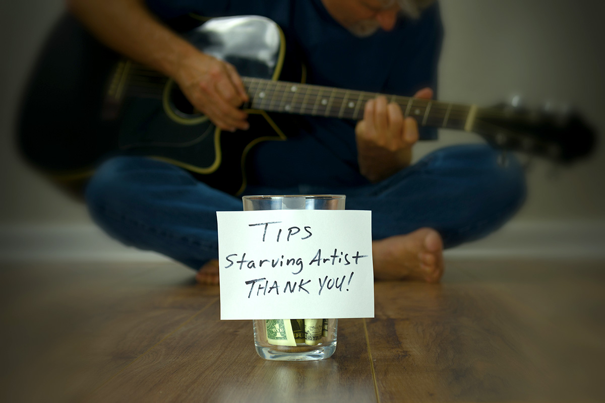 starving artist asking for tips. poverty mindset